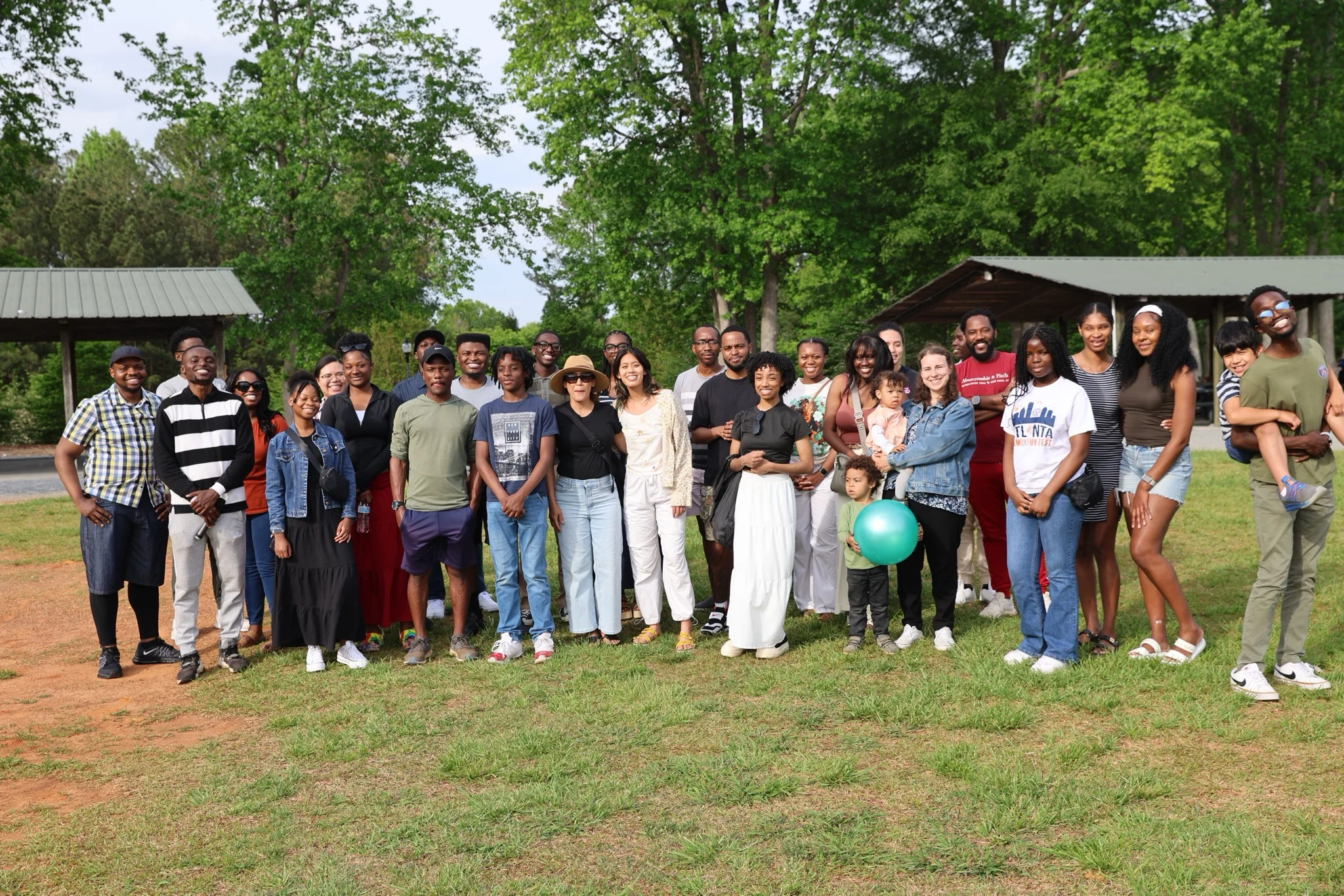 Mogaka Christian fellowship group of friends laughing and sharing community in Atlanta